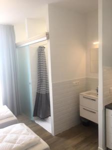 Postel nebo postele na pokoji v ubytování Sissi Apartments