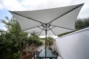 Patio lub wspólna przestrzeń na świeżym powietrzu w obiekcie Salento Sea & Sun