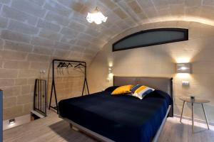 Postel nebo postele na pokoji v ubytování Lo Strazzo - Comfort Rooms