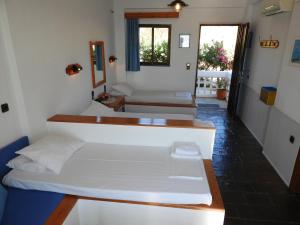 Posteľ alebo postele v izbe v ubytovaní Diana Apartments