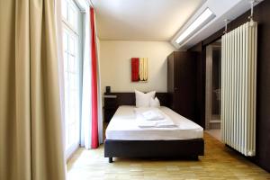Postel nebo postele na pokoji v ubytování Santé Royale Hotel- & Gesundheitsresort Bad Brambach