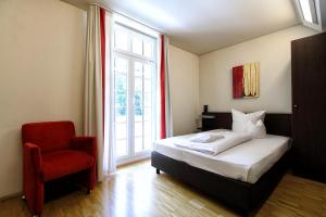 Postel nebo postele na pokoji v ubytování Santé Royale Hotel- & Gesundheitsresort Bad Brambach + 27 fotografií