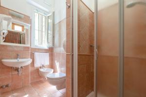 Koupelna v ubytování Hostel Archi Rossi + 22 fotografií