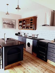 Kuchyň nebo kuchyňský kout v ubytování Ash Cottage
