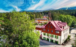 an aerial view of a building in a town at Leśny Dwór in Karpacz