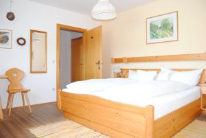 Katil atau katil-katil dalam bilik di Weingut Schlafgut Genussgut Lorenz
