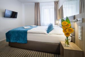 Krevet ili kreveti u jedinici u okviru objekta Hotel White Lion
