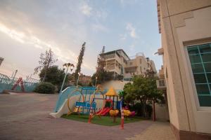 Detský kútik v ubytovaní Seven Garden Alhada Suites