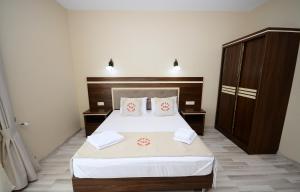 Postel nebo postele na pokoji v ubytování Hotel 725 B
