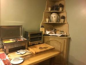 Kuchyň nebo kuchyňský kout v ubytování Hotel Bocalé