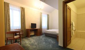 Postel nebo postele na pokoji v ubytování Apartmán Lednice