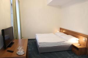 Postel nebo postele na pokoji v ubytování Apartmán Lednice