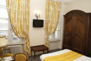 TV a/nebo společenská místnost v ubytování Hotel Montsegur