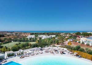 an aerial view of a resort with a swimming pool at VOI Marsa Siclà Essentia in Sampieri