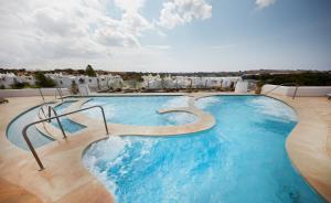 a large swimming pool on top of a building at VOI Marsa Siclà Essentia in Sampieri