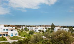 a view of a row of white houses at VOI Marsa Siclà Essentia in Sampieri