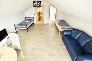 Ein Sitzbereich in der Unterkunft Apartment Köln Porz