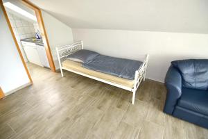 Ein Bett oder Betten in einem Zimmer der Unterkunft Apartment Köln Porz
