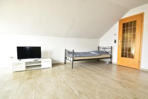 Ein Bett oder Betten in einem Zimmer der Unterkunft Apartment Köln Porz