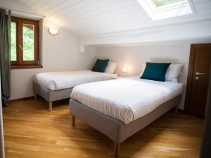 Ένα ή περισσότερα κρεβάτια σε δωμάτιο στο Mansarda sotto le stelle