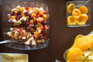 a salad in a plastic container with fruits and vegetables at Vila Gale Cascais in Cascais