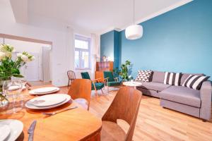 Posezení v ubytování Grand Central Apartment