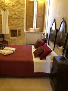 Postel nebo postele na pokoji v ubytování Borgo in corte