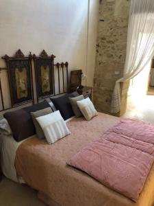 Postel nebo postele na pokoji v ubytování Borgo in corte