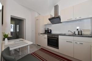 Köök või kööginurk majutusasutuses Apartments Alter Platz