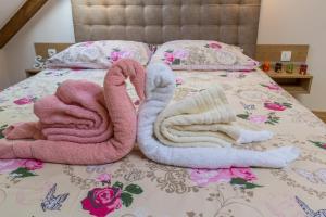 Postel nebo postele na pokoji v ubytování Fiumanka