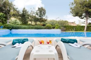 The swimming pool at or close to Abba Garden