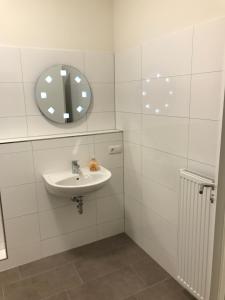 Ett badrum på Hotel Fame am Hauptbahnhof