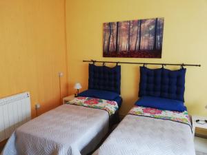 Postel nebo postele na pokoji v ubytování Bed and Breakfast Porta Romana