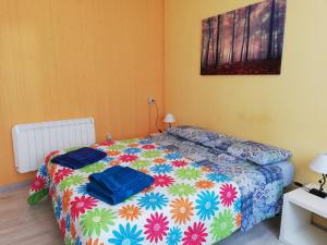 Postel nebo postele na pokoji v ubytování Bed and Breakfast Porta Romana