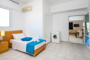 Posteľ alebo postele v izbe v ubytovaní Mon Repos Hotel
