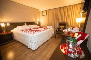 Postel nebo postele na pokoji v ubytování Hotel Campo Largo Comfort