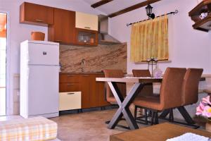 Kuchyň nebo kuchyňský kout v ubytování Holiday Home Magdalena