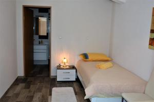 Postel nebo postele na pokoji v ubytování Holiday Home Magdalena