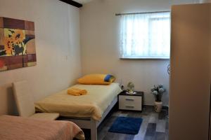 Postel nebo postele na pokoji v ubytování Holiday Home Magdalena