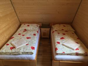Voodi või voodid majutusasutuse Cottage Family toas