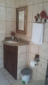 Ванная комната в Suítes Doce Jasmim