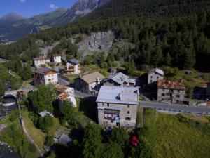 an aerial view of a small village in the mountains at Guesthouse Seghetto in Valdidentro