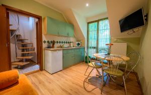 A kitchen or kitchenette at Penzion Sonja