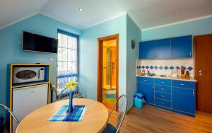 A kitchen or kitchenette at Penzion Sonja