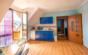A kitchen or kitchenette at Penzion Sonja