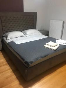 Säng eller sängar i ett rum på Athens-Glyfada apartment