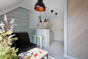 Kuchyň nebo kuchyňský kout v ubytování Pokoje i Apartamenty Poddąbie 2