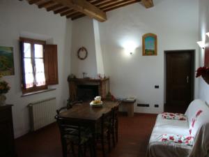 A bed or beds in a room at Agriturismo Podere Molino