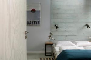 Postel nebo postele na pokoji v ubytování Pokoje i Apartamenty Poddąbie 2