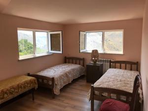 Postel nebo postele na pokoji v ubytování COMMUNE hotel